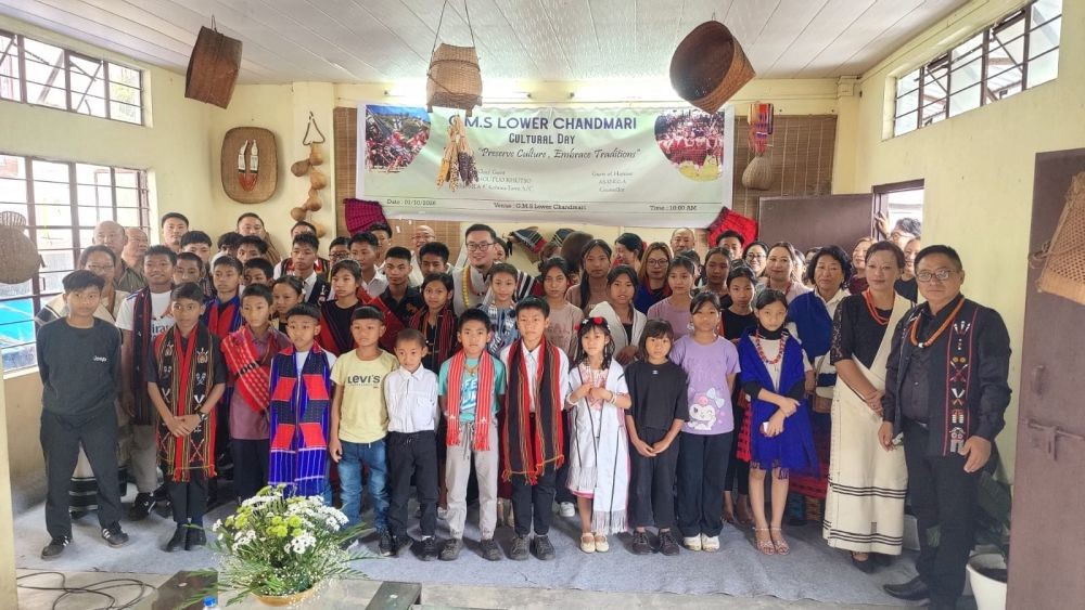 Dr Keneilhoulie Medom and other with performers of cultural day at GMS Lower Chandmari, Kohima. (Morung Photo)